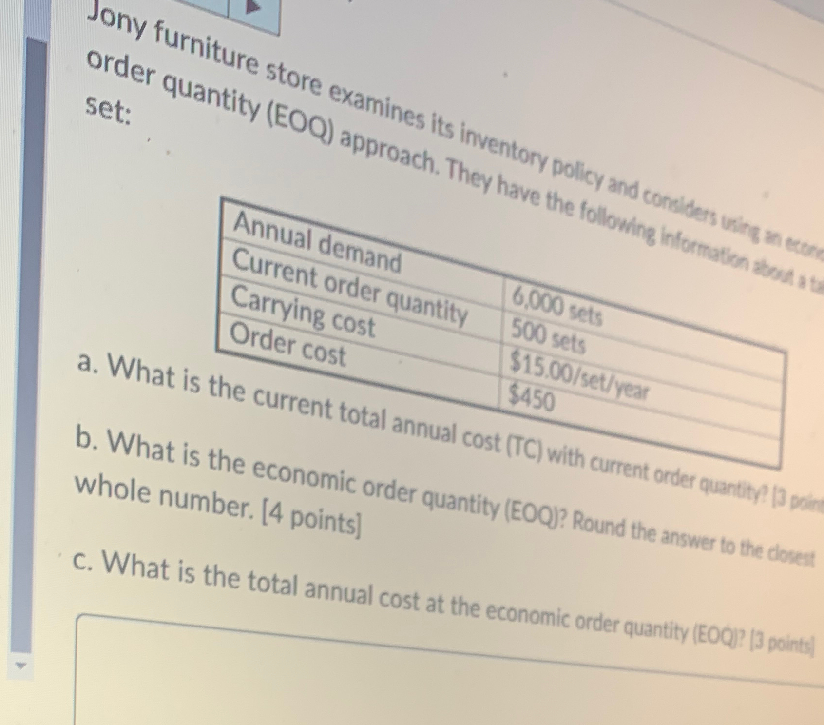  set: \table[[Annual demand,],[Current order quantity,6.000 sets],[Carrying cost,500 sets],[Order cost,$15.00? set/year]] a.