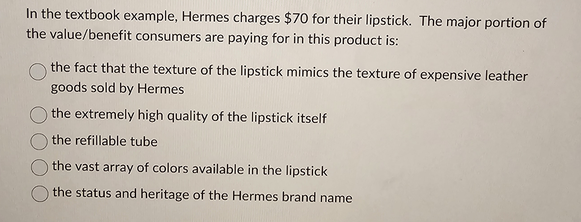  In the textbook example, Hermes charges $70 for their lipstick. The