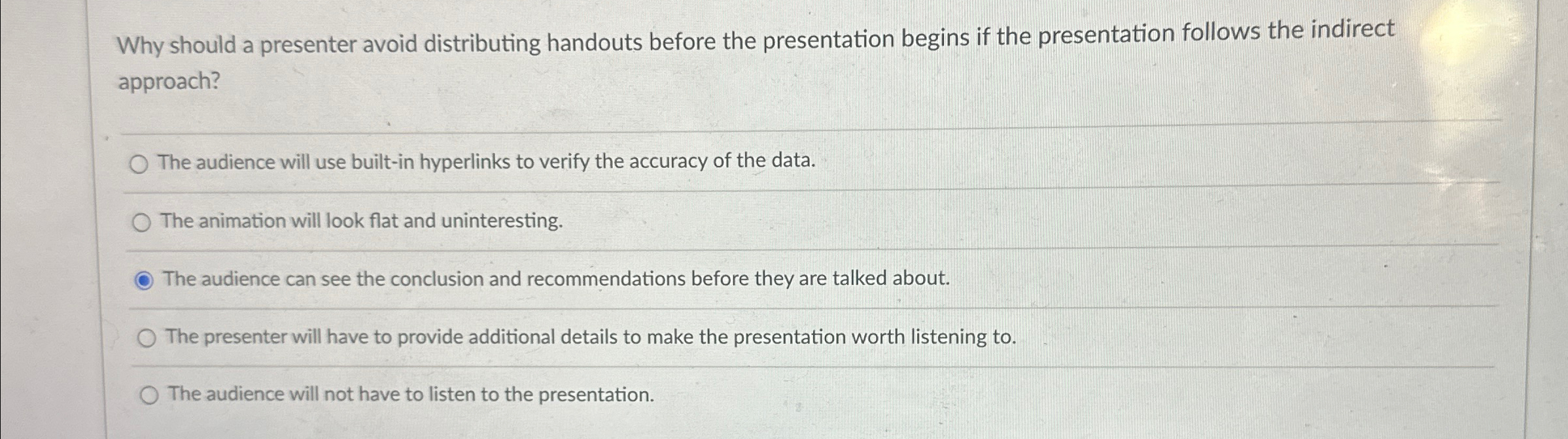  Why should a presenter avoid distributing handouts before the presentation begins