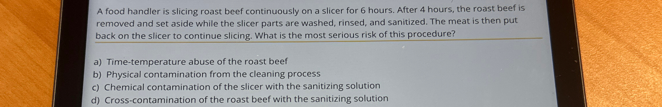 A food handler is slicing roast beef continuously on a slicer