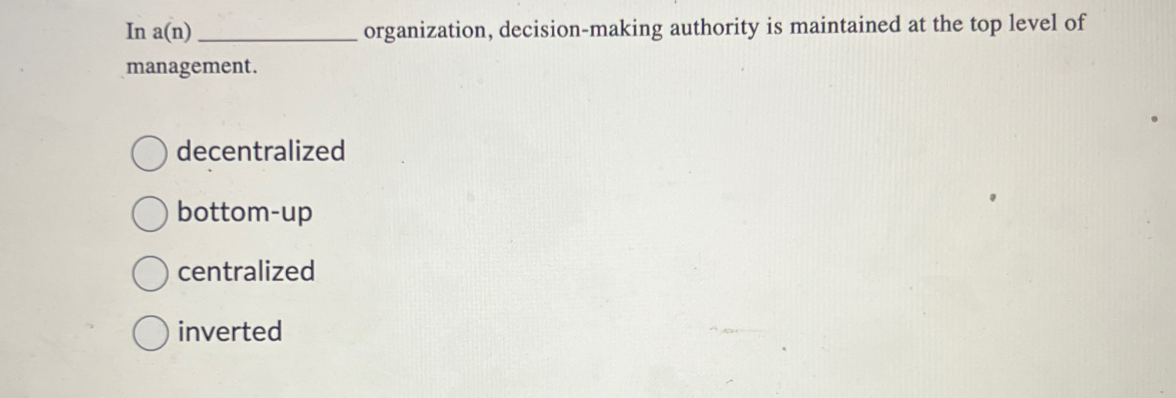  In a(n) organization, decision-making authority is maintained at the top level