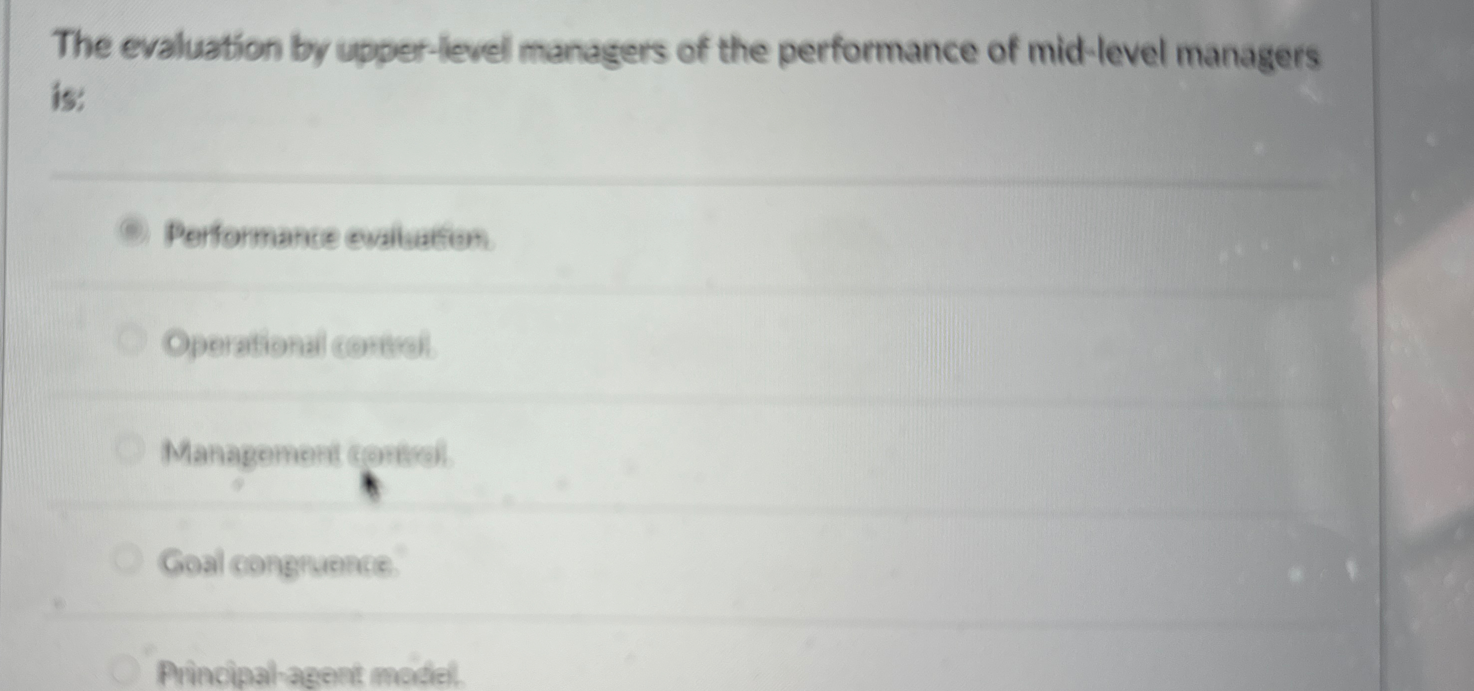  The evaluation by upper-level managers of the performance of mid-level managers