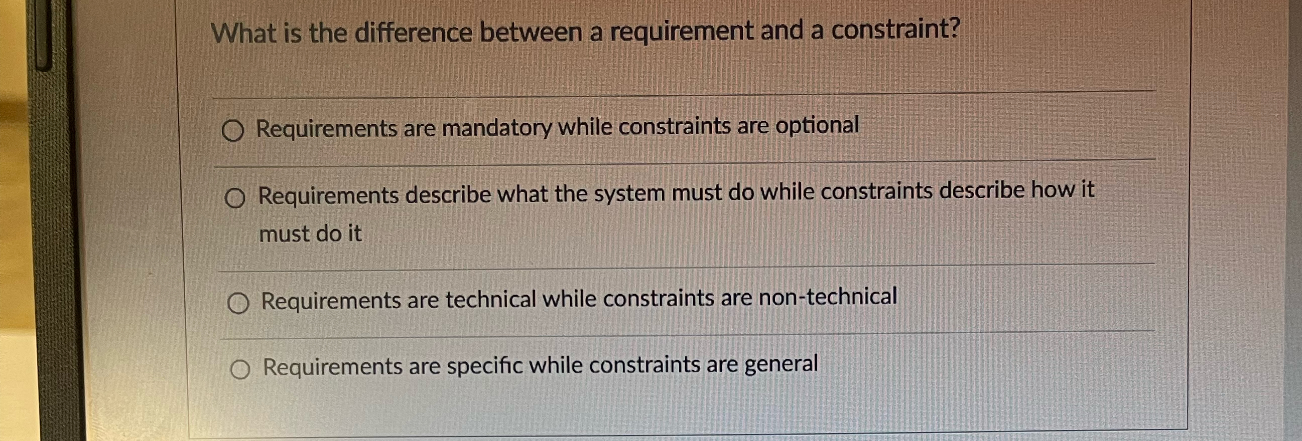  What is the difference between a requirement and a constraint? q,