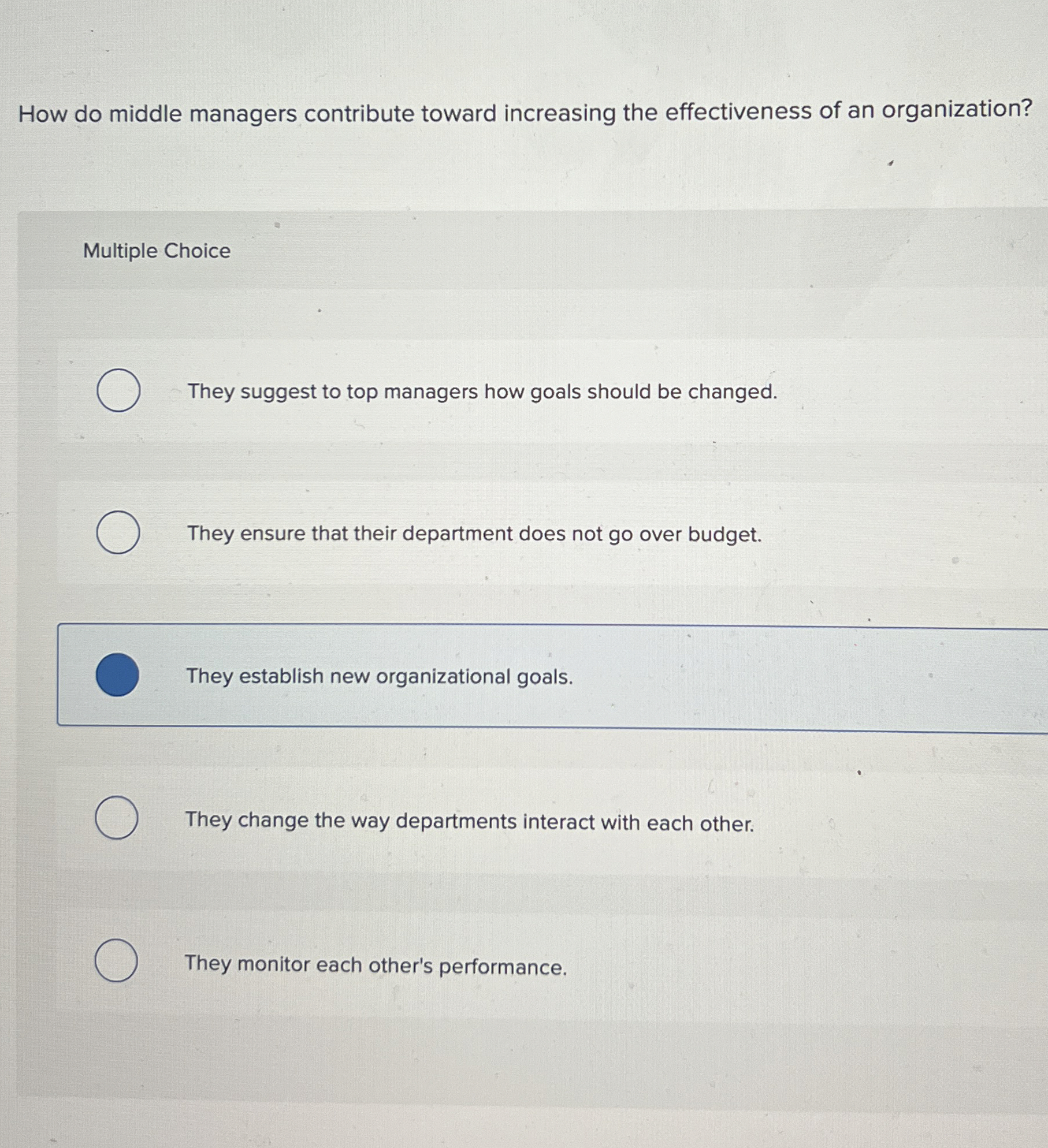  How do middle managers contribute toward increasing the effectiveness of an