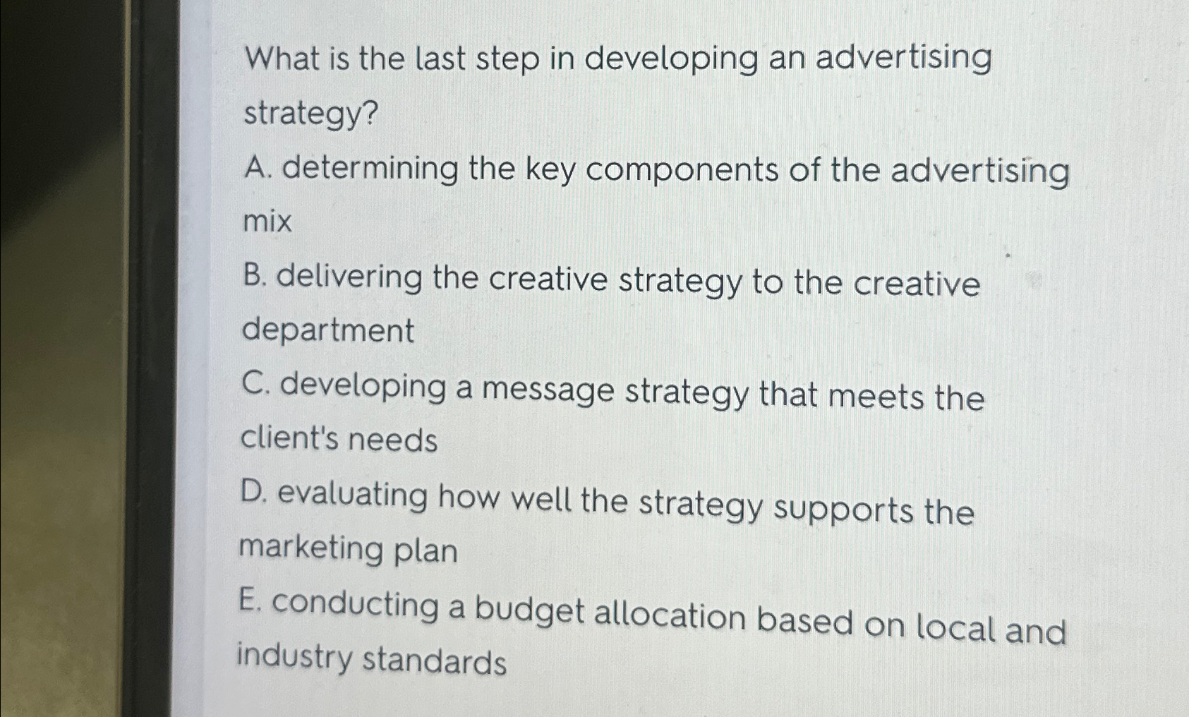  What is the last step in developing an advertising strategy? A.