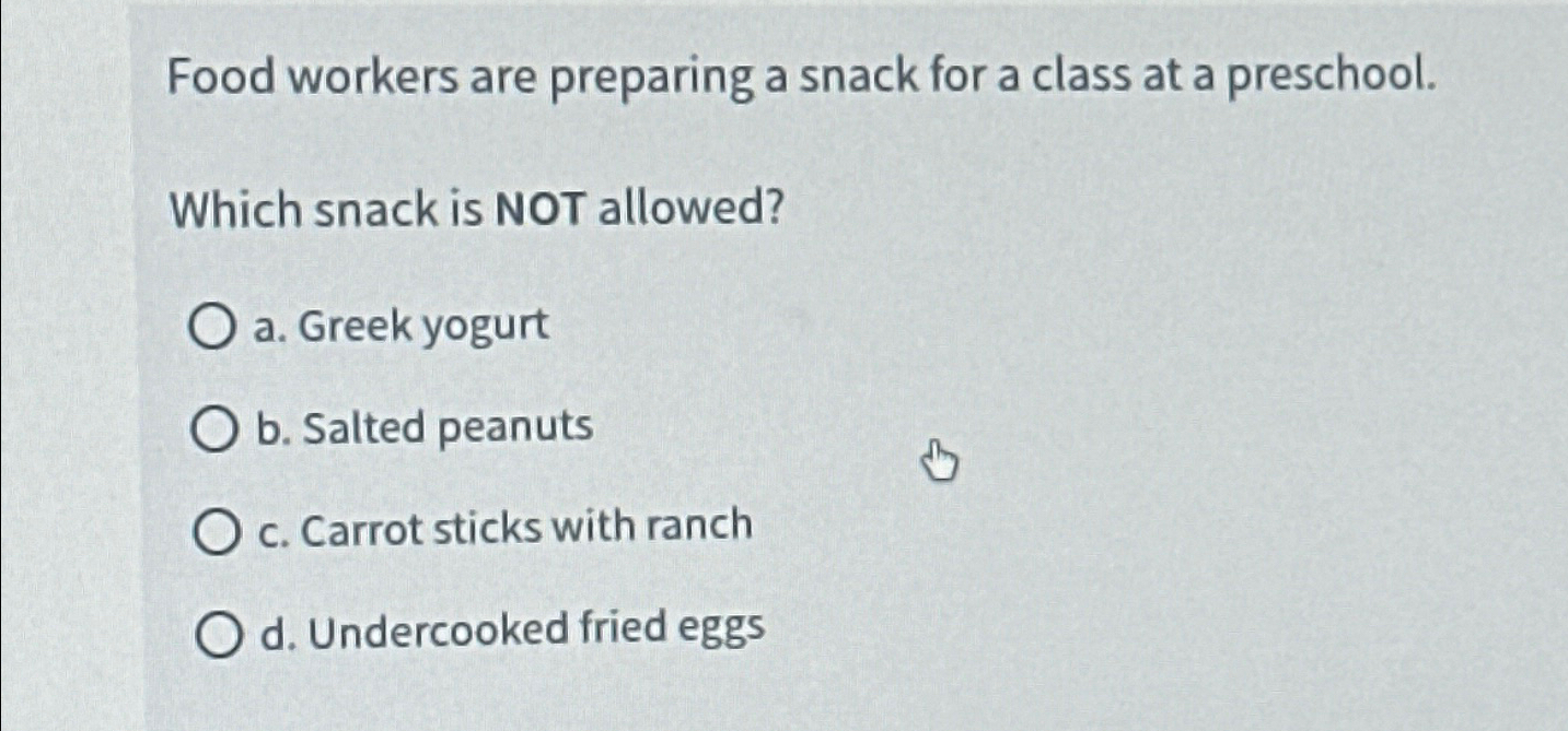  Food workers are preparing a snack for a class at a