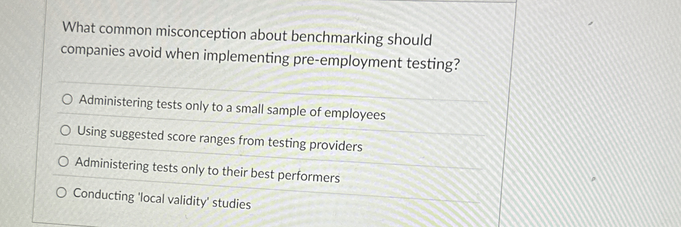  What common misconception about benchmarking should companies avoid when implementing pre-employment