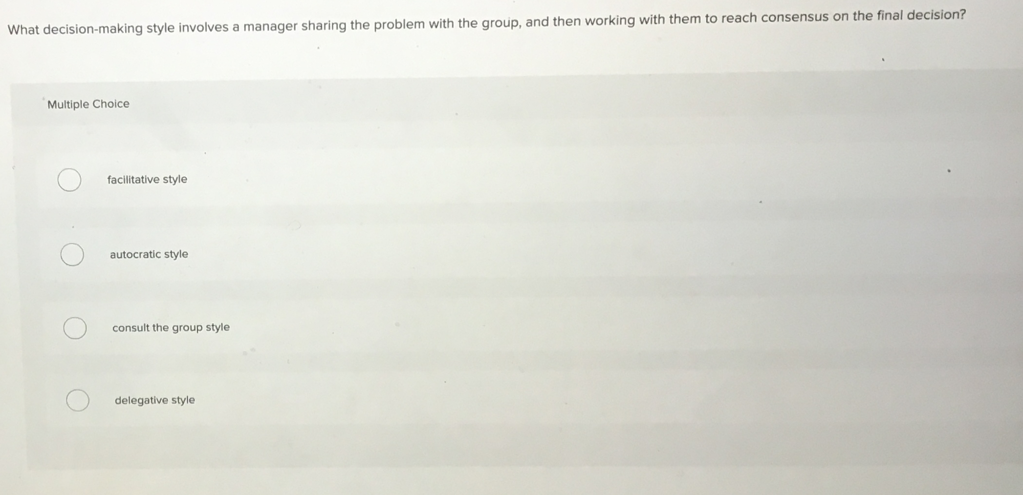  What decision-making style involves a manager sharing the problem with the
