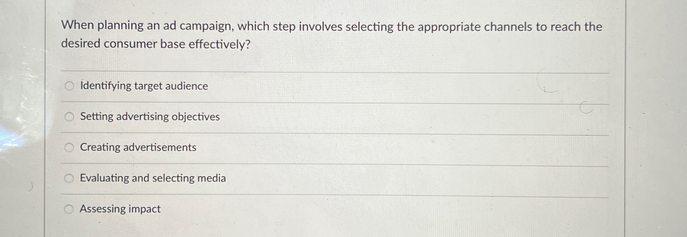  When planning an ad campaign, which step involves selecting the appropriate