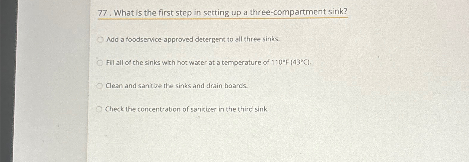  What is the first step in setting up a three-compartment sink?