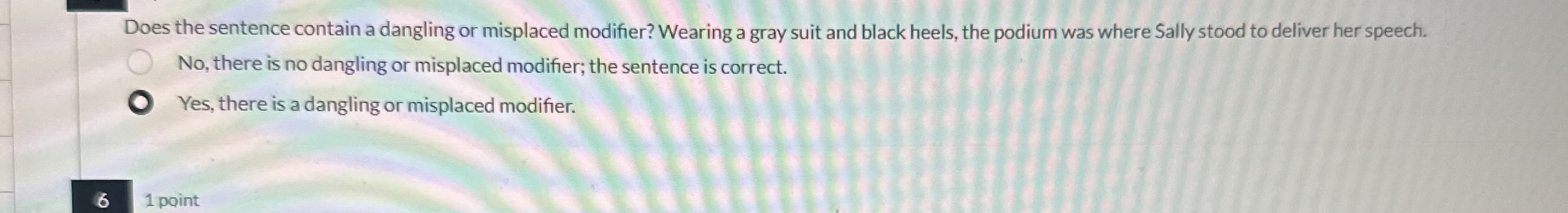  Does the sentence contain a dangling or misplaced modifier? Wearing a