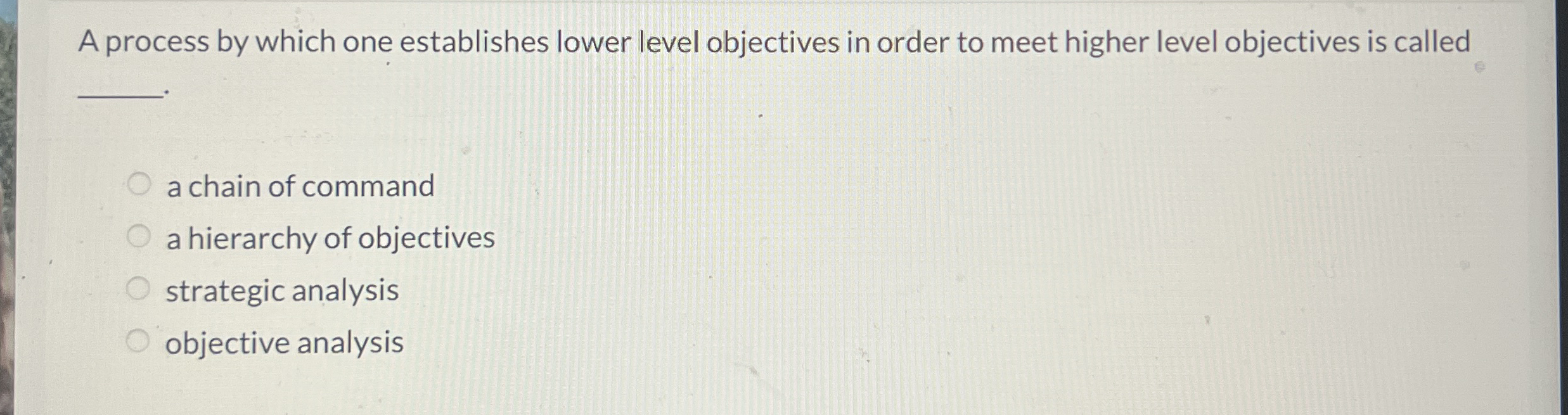  A process by which one establishes lower level objectives in order