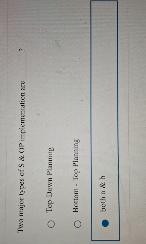  Two major types of S & OP implementation are q,? Top-Down