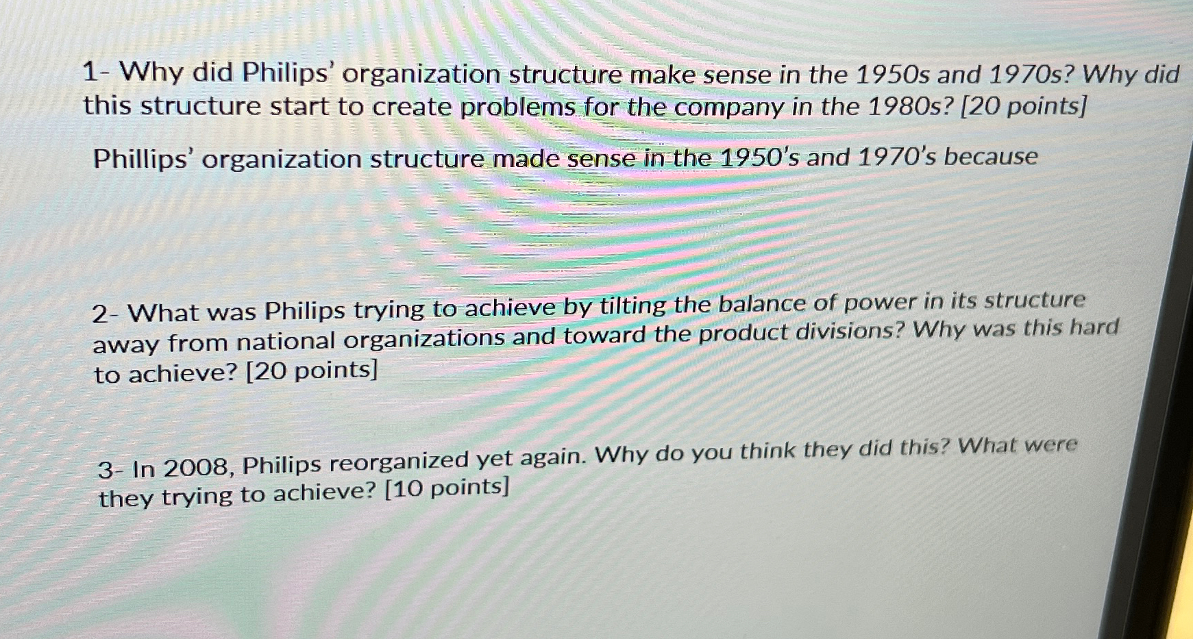  1- Why did Philips' organization structure make sense in the 1950
