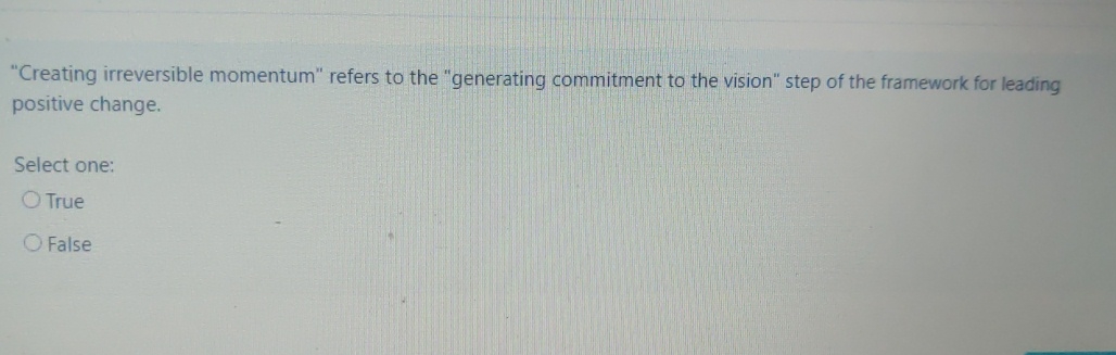  "Creating irreversible momentum" refers to the "generating commitment to the vision"