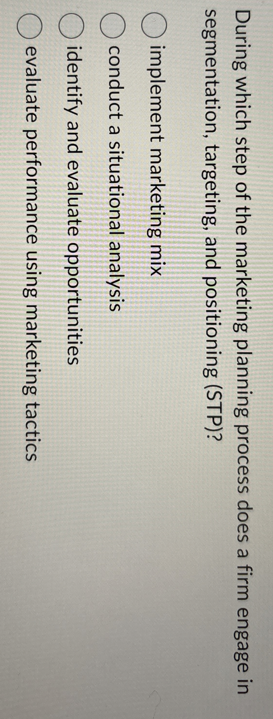  During which step of the marketing planning process does a firm