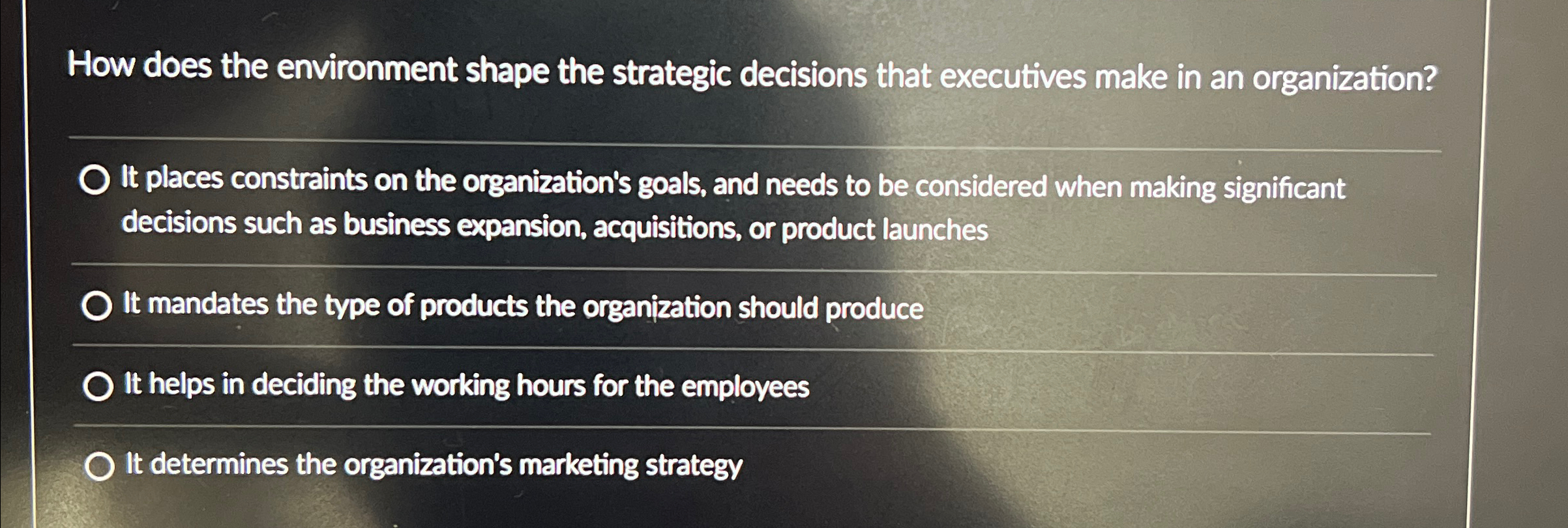  How does the environment shape the strategic decisions that execulives make