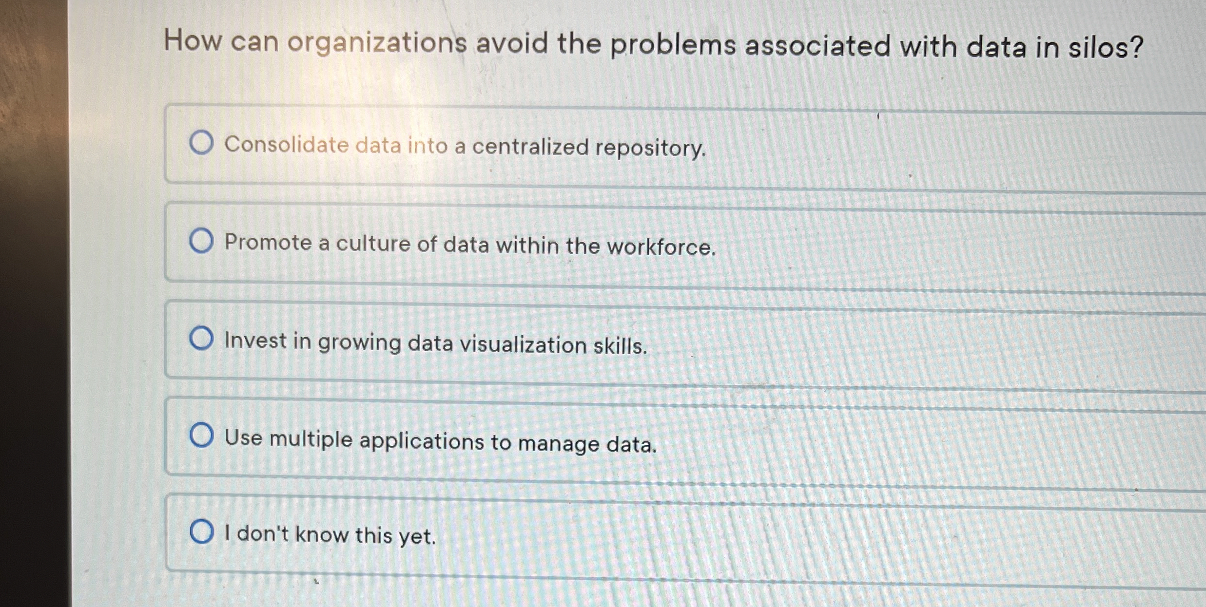  How can organizations avoid the problems associated with data in silos?