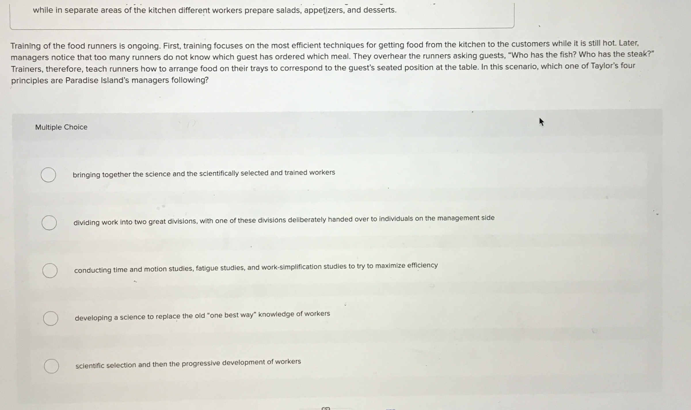  while in separate areas of the kitchen different workers prepare salads,