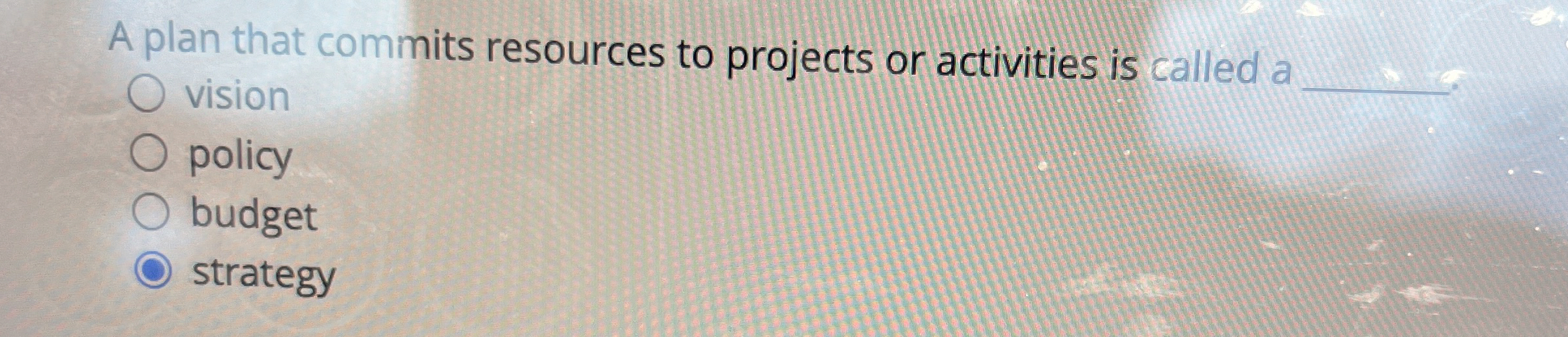  A plan that commits resources to projects or activities is called