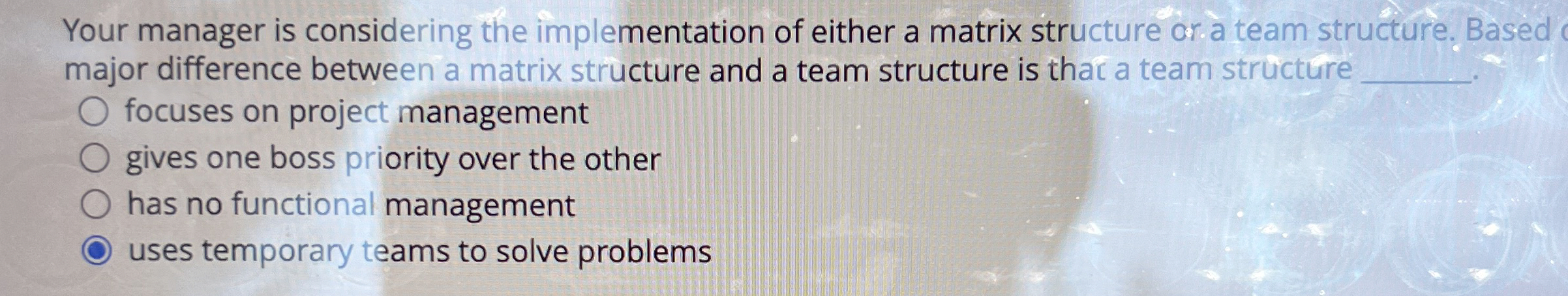  Your manager is considering the implementation of either a matrix structure