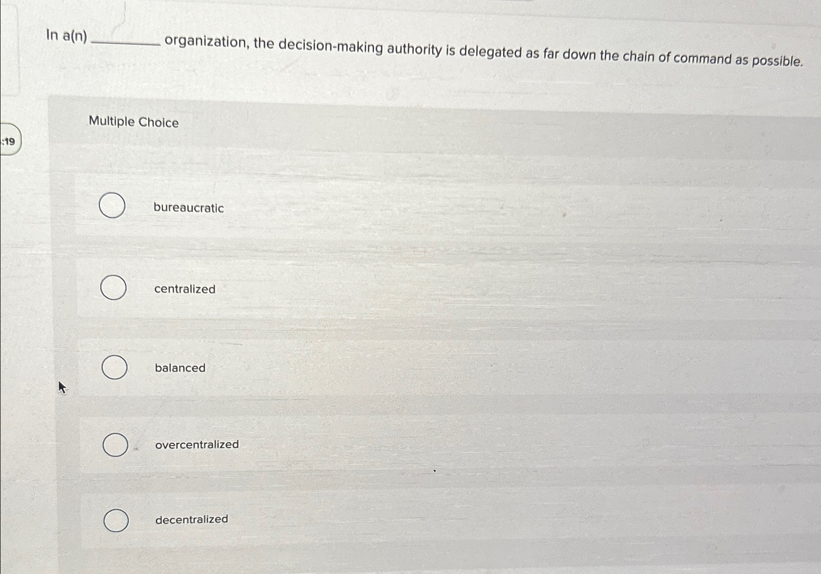  In a(n) organization, the decision-making authority is delegated as far down