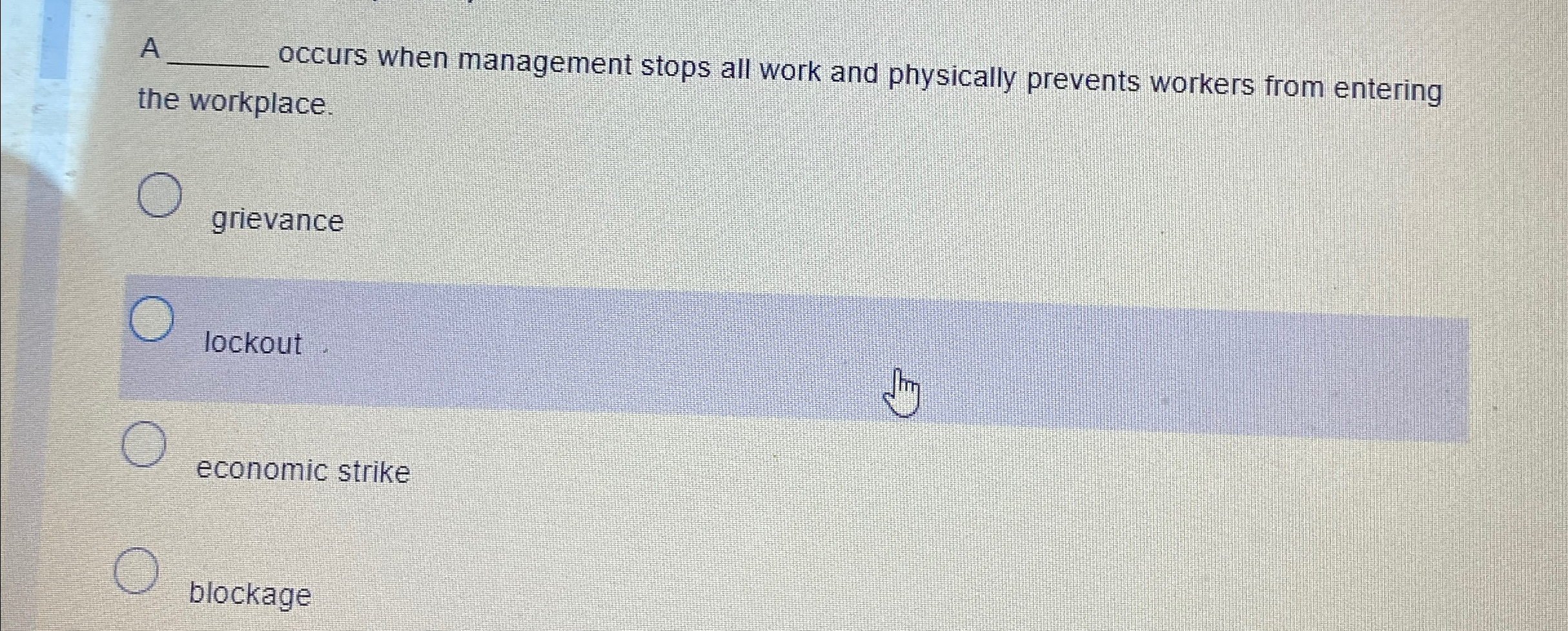  A q, occurs when management stops all work and physically prevents