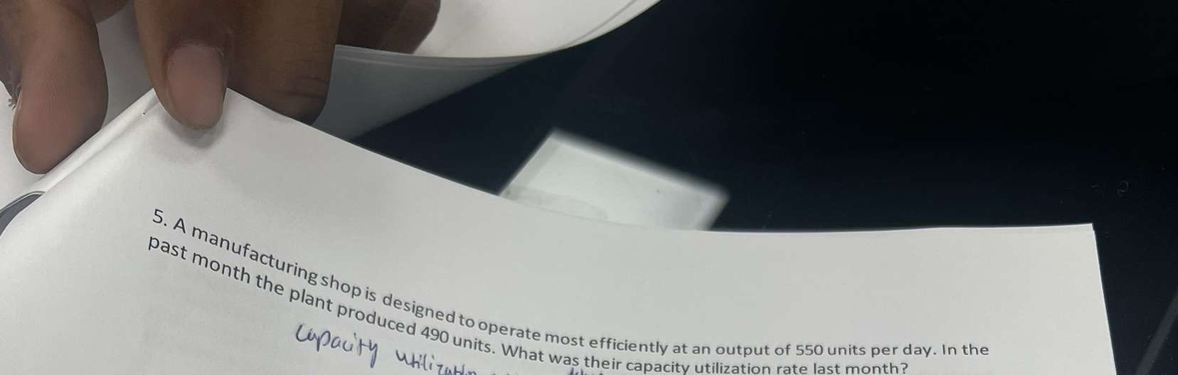  Cupacity 490 units. What was their capacity utilization rate last month?
