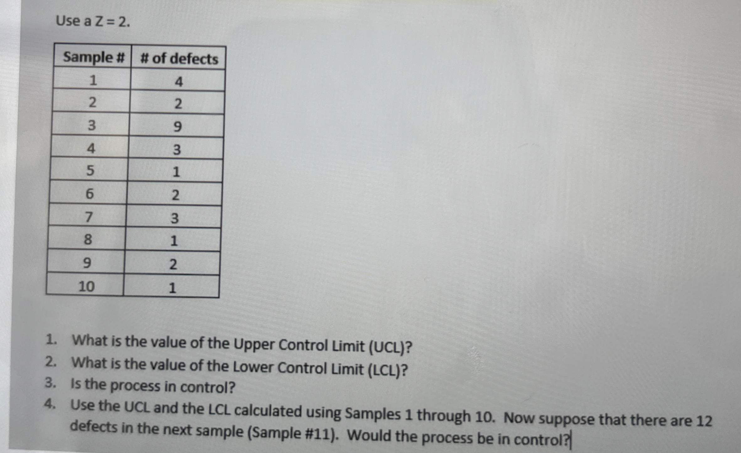  Use a Z =2. \table[[Sample #,# of defects],[1,4],[2,2],[3,9],[4,3],[5,1],[6,2],[7,3],[8,1],[9,2],[10,1]] What is the