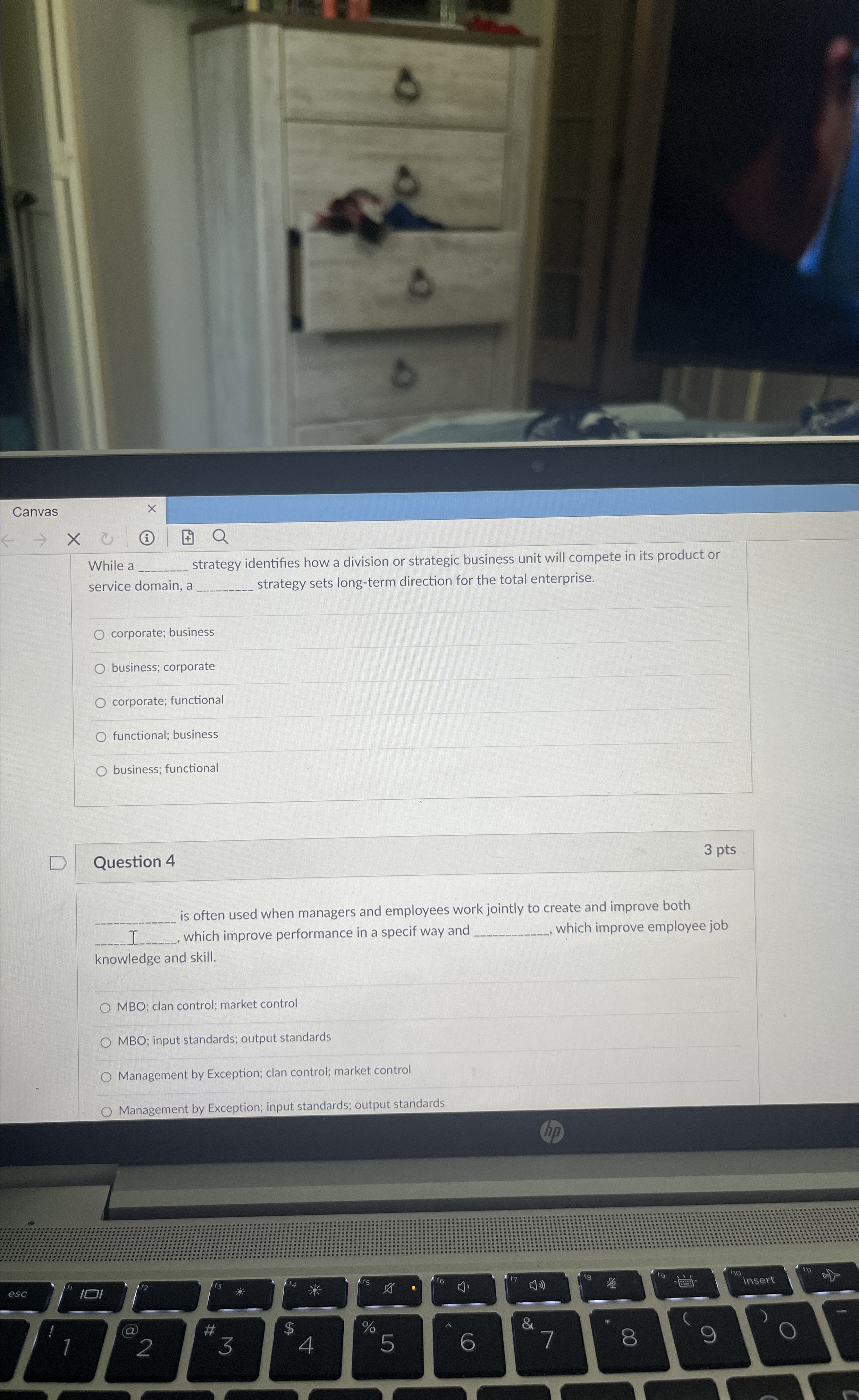  While a q, strategy identifies how a division or strategic business