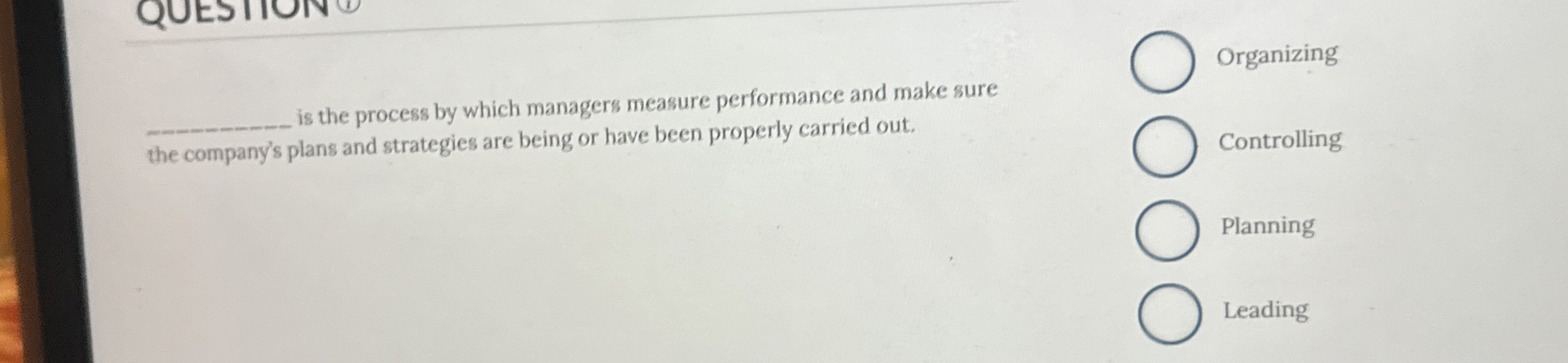  QUESIIUN q, is the process by which managers measure performance and