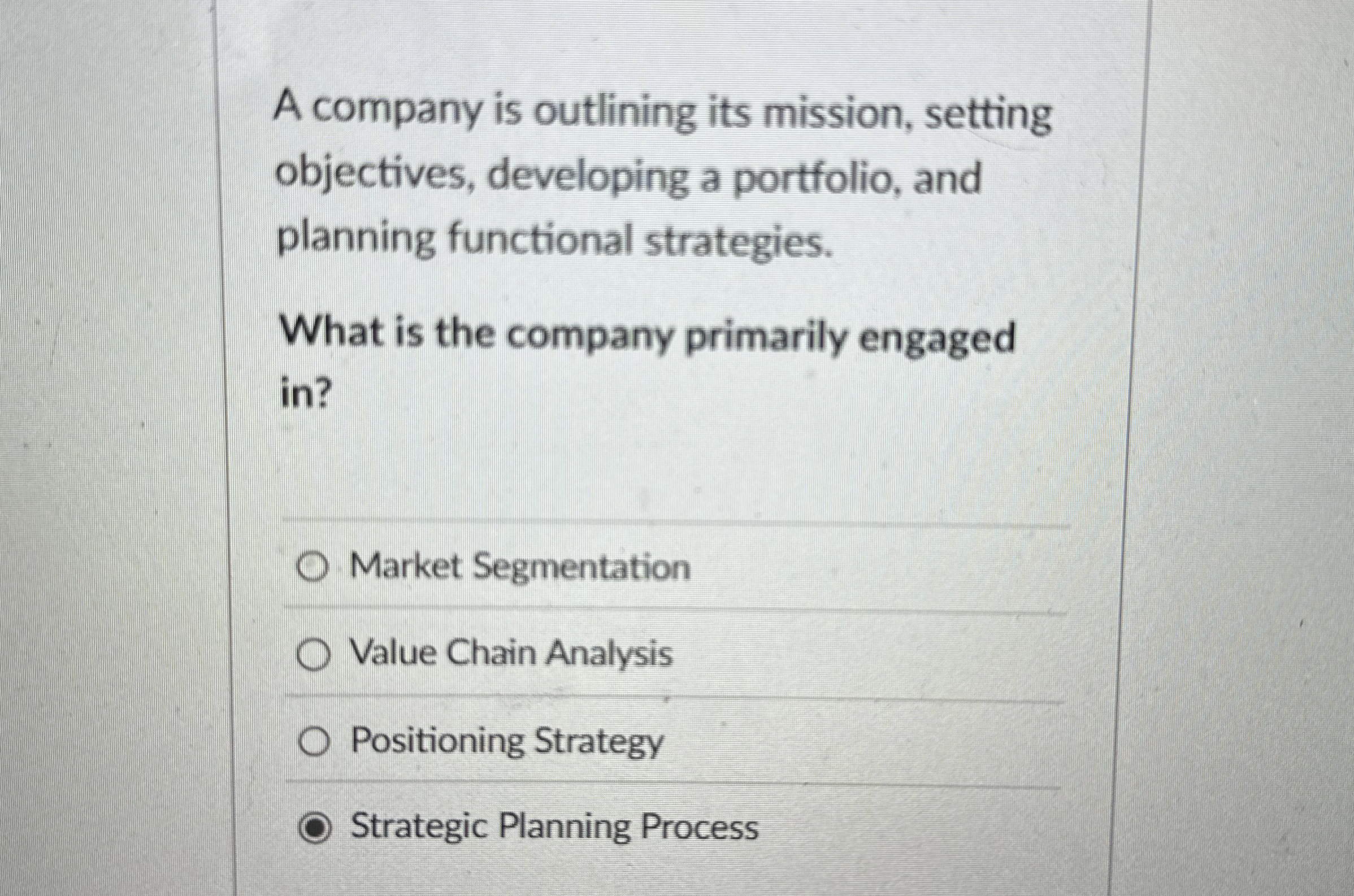  A company is outlining its mission, setting objectives, developing a portfolio,