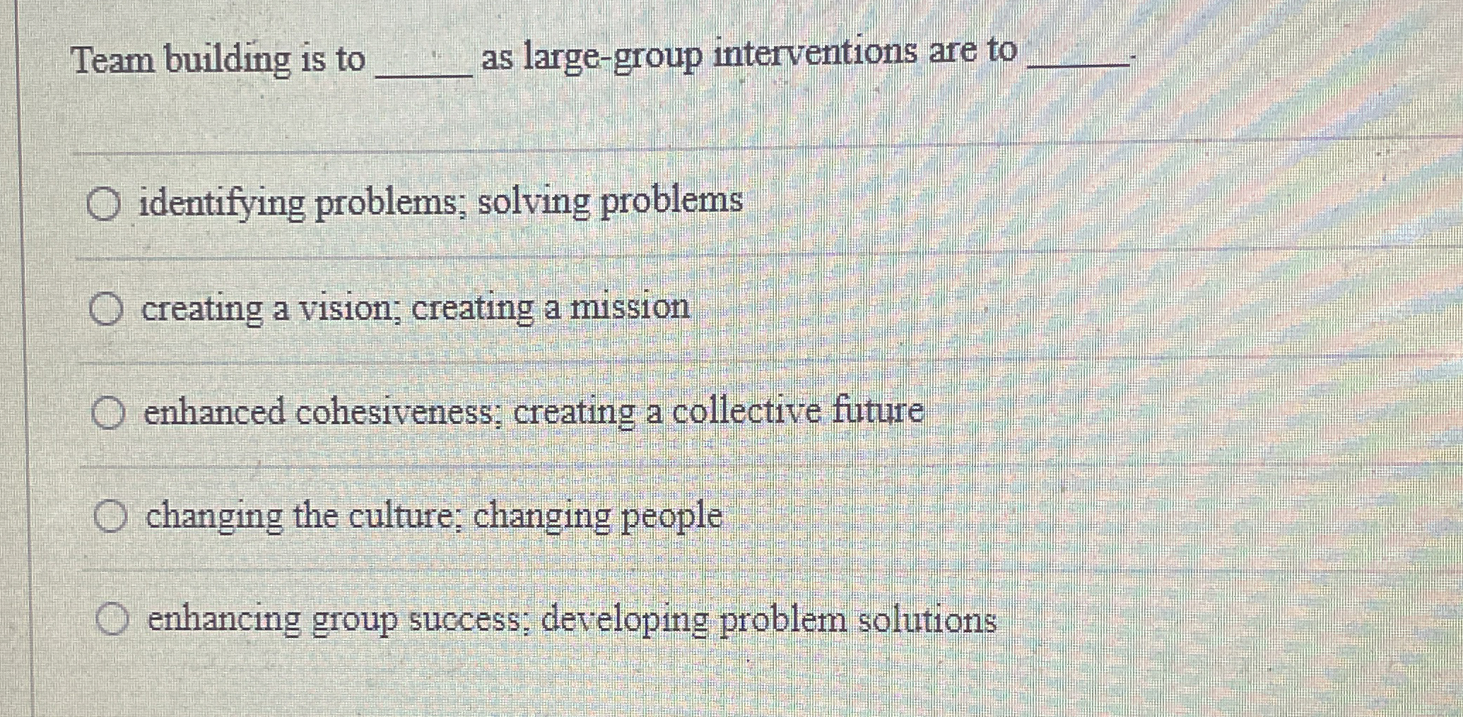  Team building is to q, as large-group interventions are to q,-