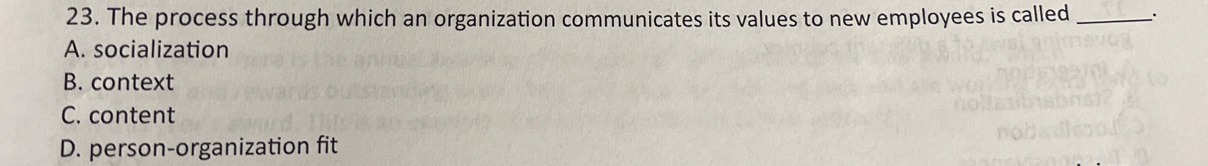  The process through which an organization communicates its values to new