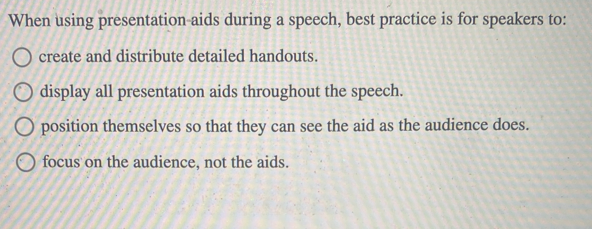  When using presentation-aids during a speech, best practice is for speakers
