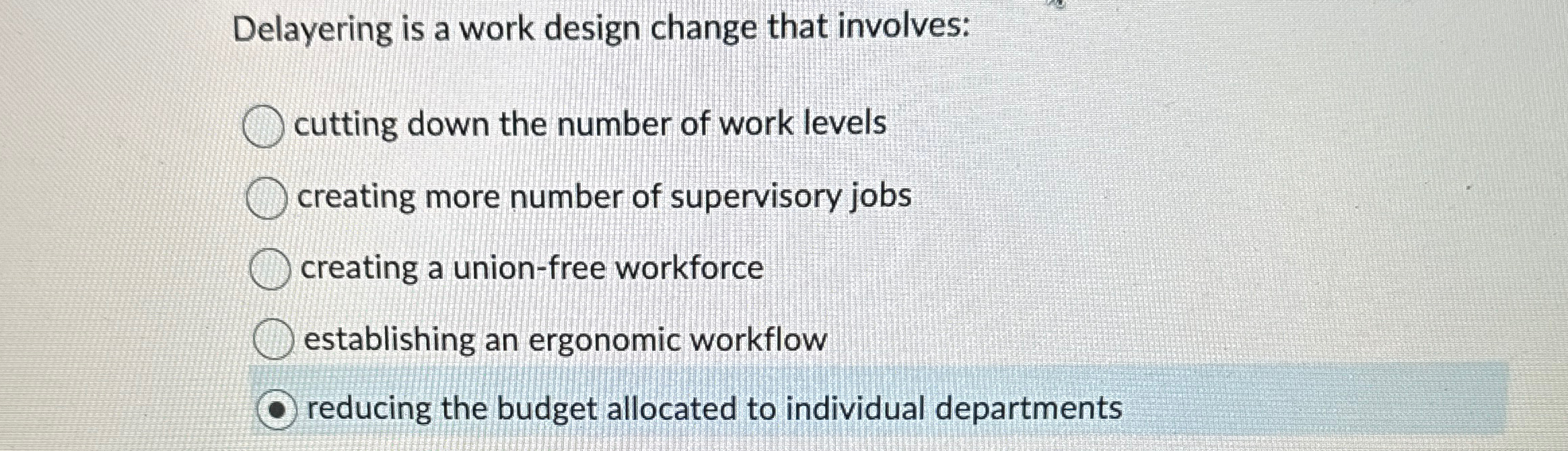  Delayering is a work design change that involves: cutting down the