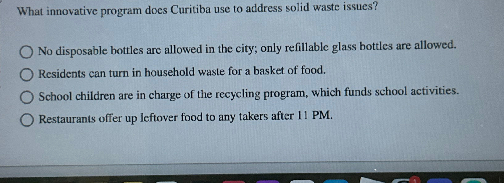  What innovative program does Curitiba use to address solid waste issues?
