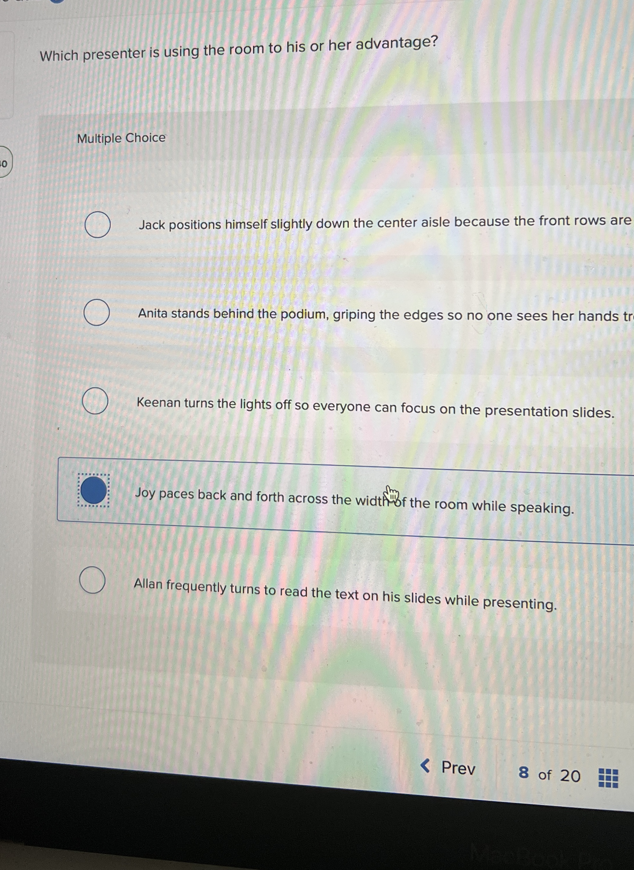  Which presenter is using the room to his or her advantage?