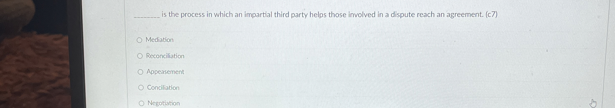  is the process in which an impartial third party helps those