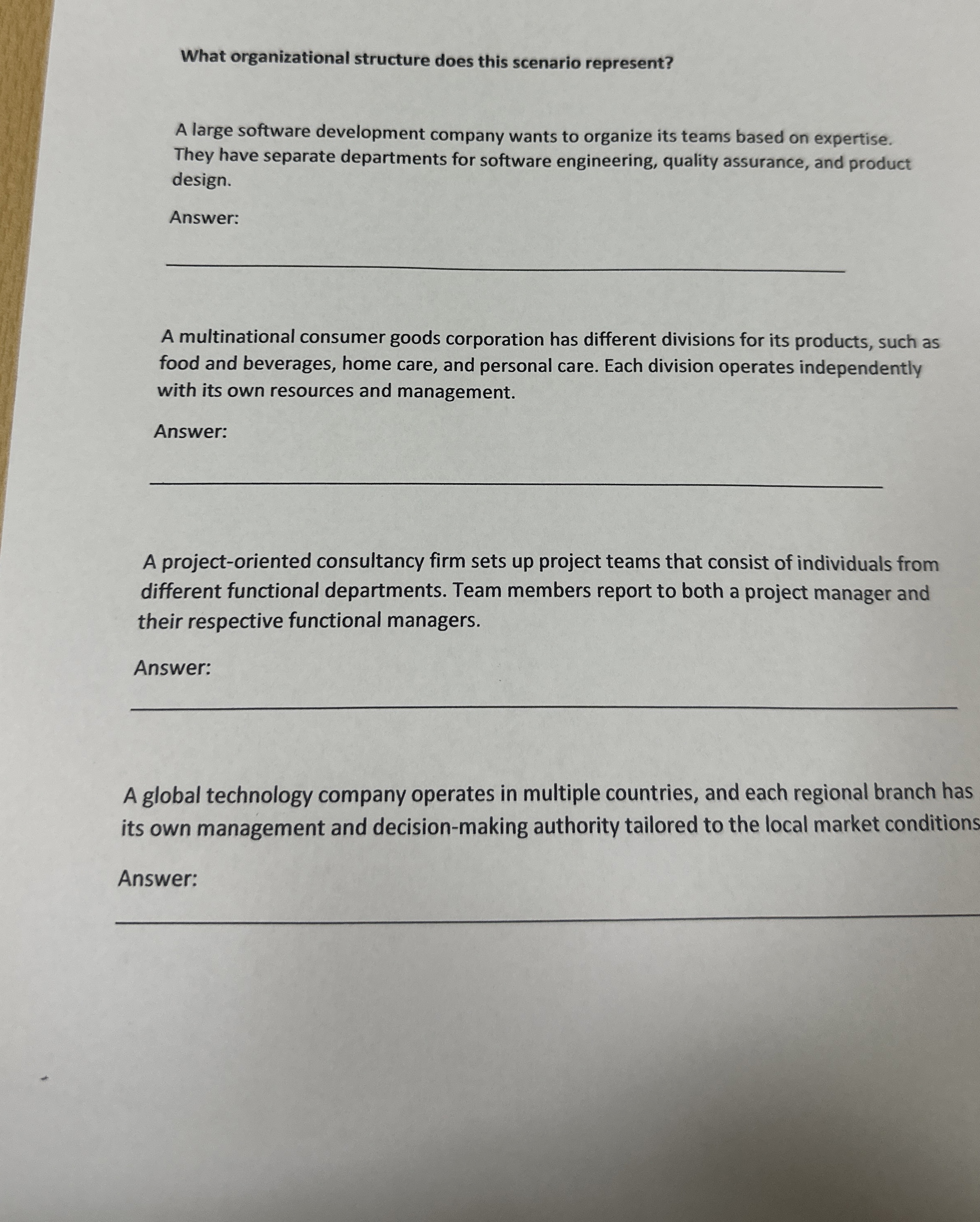  What organizational structure does this scenario represent? A large software development
