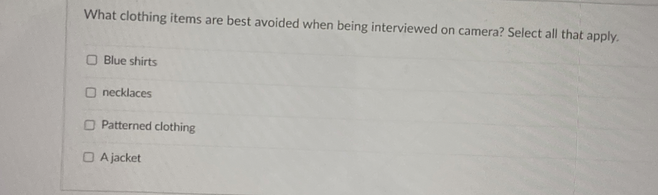  What clothing items are best avoided when being interviewed on camera?