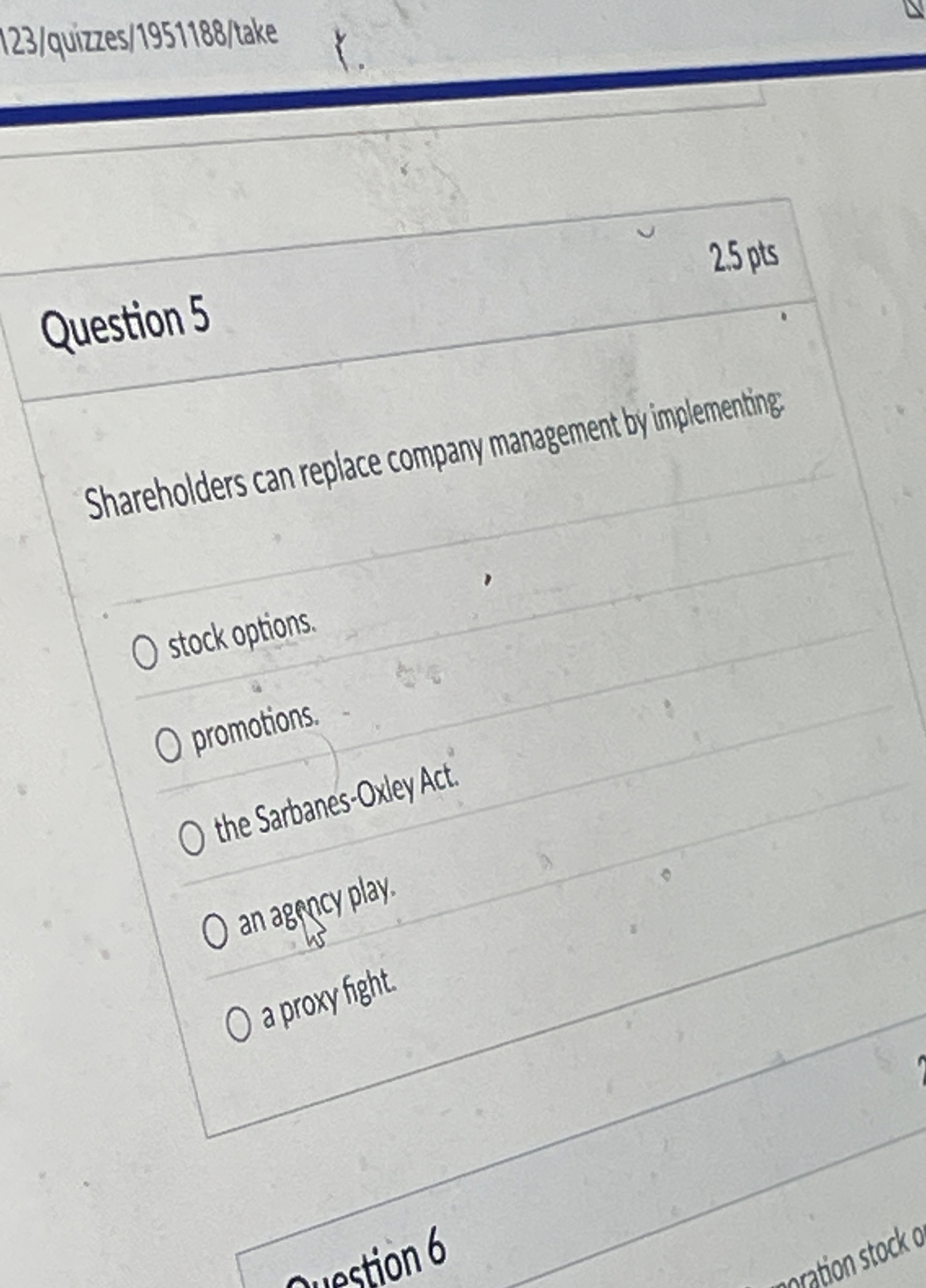  Question5 Shareholders can replace company management by implementing: stock options. promotions.