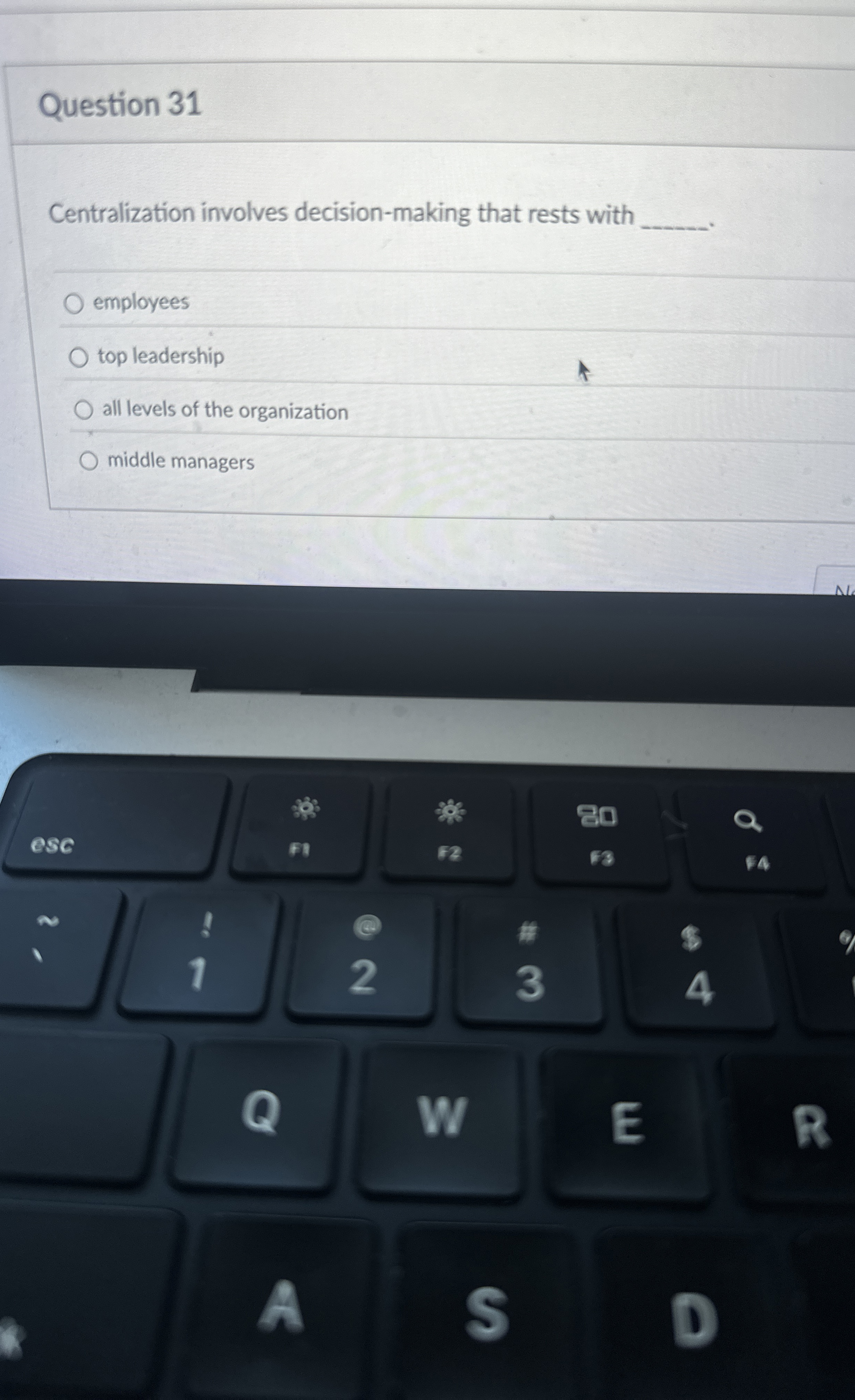  Question 31 Centralization involves decision-making that rests with q, employees top