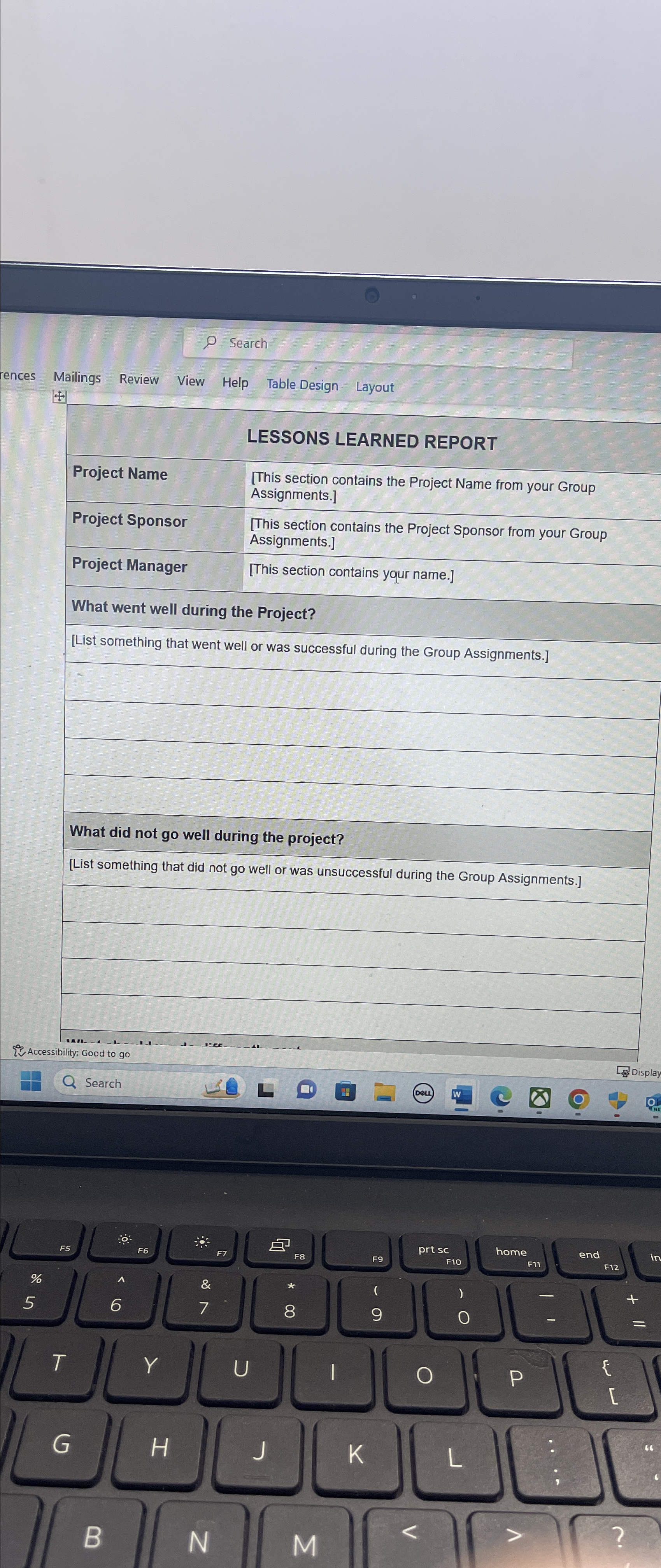  Search Mailings Review View Help Table Design Layout \table[[,LESSONS LEARNED REPORT],[Project