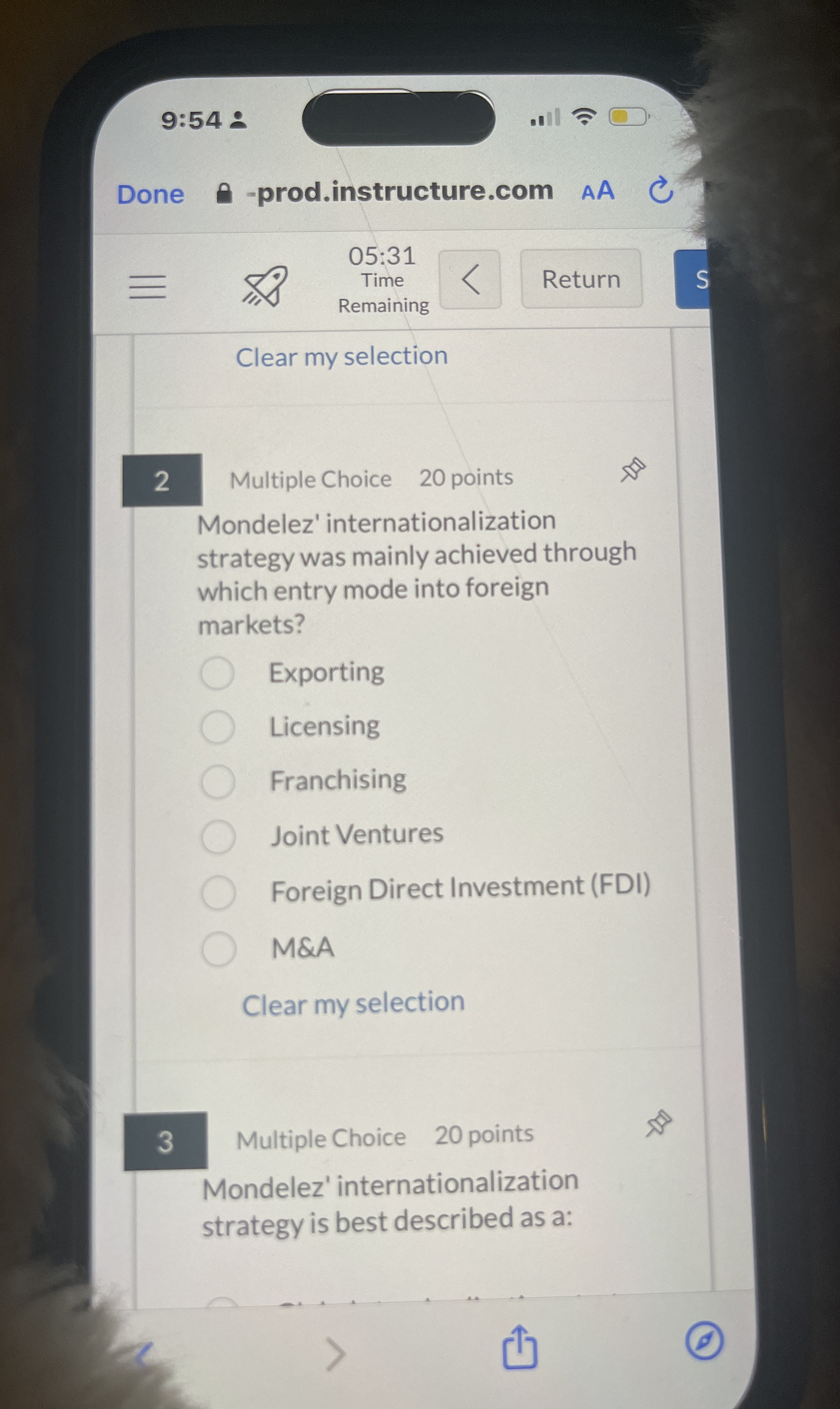  9:54- Done -prod.instructure.com AA 05:31 Time Remaining Clear my selection 2
