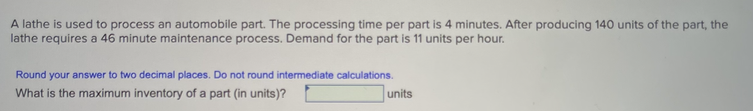 A lathe is used to process an automobile part.