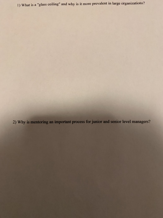 1) What is a "glass ceiling" and why is it more