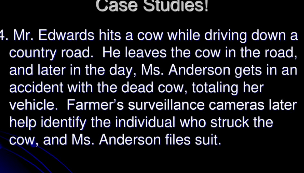 L. Mr. Edwards hits a cow while driving down a
