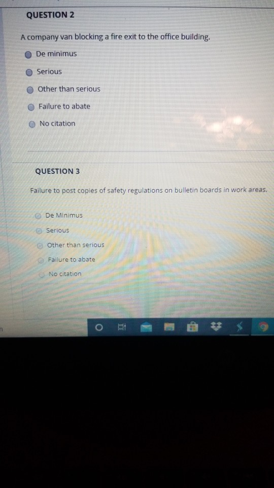 QUESTION 2 A company van blocking a fire exit to