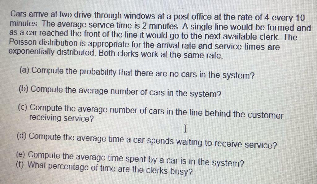 Cars arrive at two drive-through windows at a